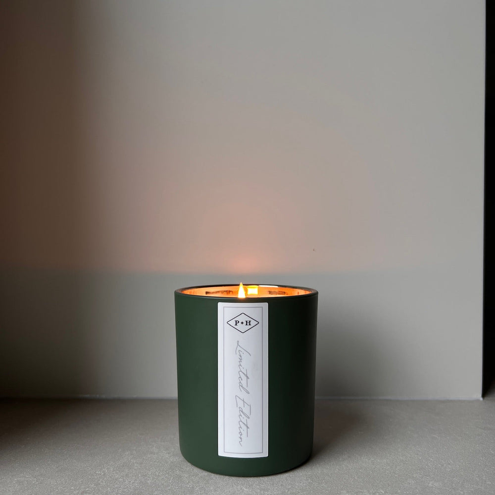 
                      
                        Holiday Cheer Candle in Evergreen + Bay Leaf
                      
                    