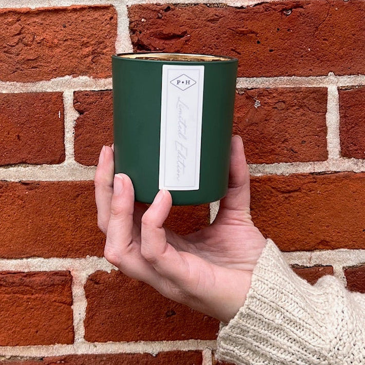 
                      
                        Holiday Cheer Candle in Evergreen + Bay Leaf
                      
                    